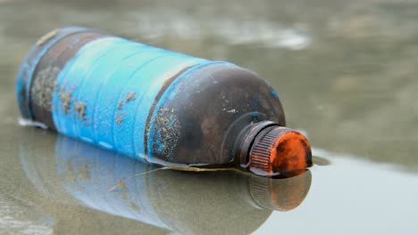 Plastic-bottle-floating-on-water