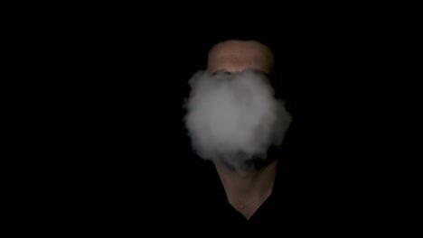 Man-disappearing-behind-smoke,-black-background