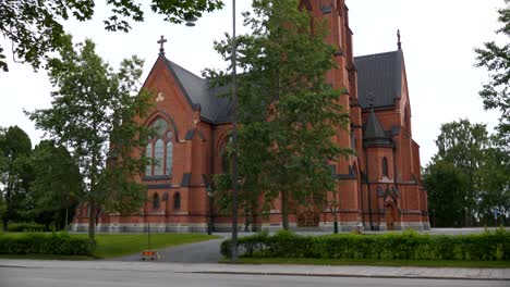 City-church-of-UmeÃ¥-in-Northern-Sweden,-slowly-tilting-up