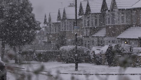 Car-Driving-Past-During-Heavy-Snowfall-Past-Residential-Houses-In-London