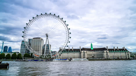 London-England,-circa-:-timelapse-London-Eye-with-Thames-River-in-London,-England