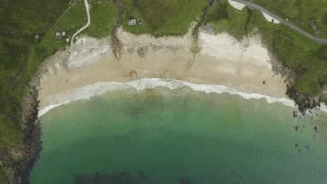 Aerial-top-down-view-of-remote-beach-in-Ireland,-travel-concept