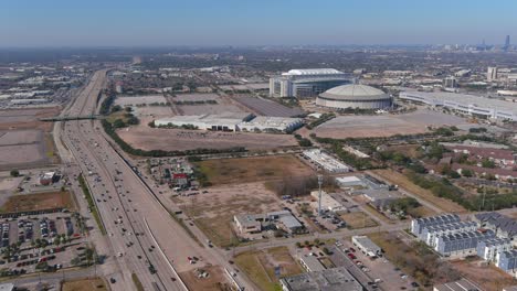 Aerial-of-the-Astrodome-and-Reliant-stadium-in-Houston,-Texas