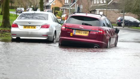 Storm-Christoph-cars-abandoned-on-flooded-town-road-disaster