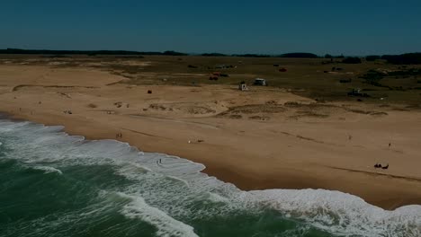 Rocha-coastal-beach-with-few-people-moving