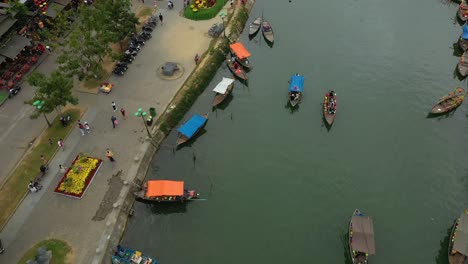 Aerial-view-of-Hoi-An-in-Vietnam-flying-over-boats