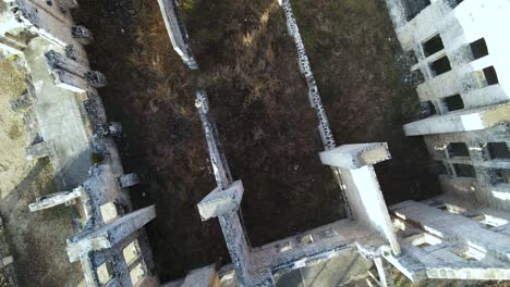 Natural-Disaster-Destroyed-and-Abandoned-Building-Ruins,-Aerial-Top-View