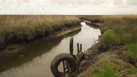 4K-repurposed-old-tires-as-fender-for-boats-to-dock-in-the-ria-de-Aveiro-in-the-estuary-of-the-river-Vouga
