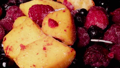 Macro-time-lapse-of-melting-exotic-fruits-for-vitamin-shake-for-breakfast