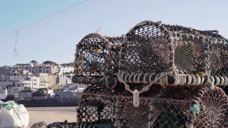 Traditional-fishing-baskets-by-the-beach-of-St-Ives,-England--wide