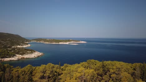 Panning-view-of-beaches-near-Vis-on-the-island-of-Vis-in-Croatia-and-small-islands-beyond