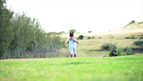 Small-South-African-girl-running-away-from-camera