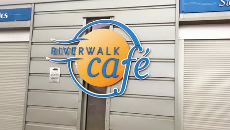 Sign-of-Riverwalk-Cafe-on-Detroit-Riverfront-in-Downtown-Detroit,-Michigan,-USA