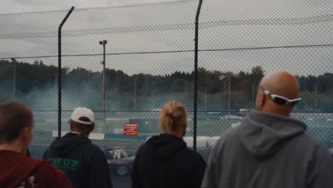 Moving-Shot-of-Fans-and-Spectators-Watching-a-Drifting-Competition