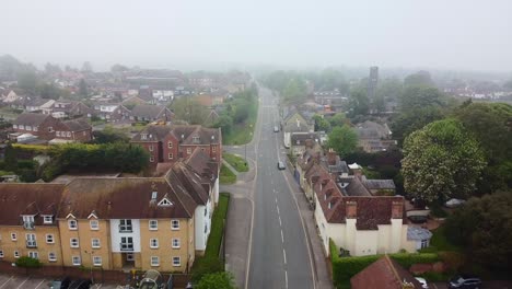 Aerial-drone-slowly-moving-through-empty-English-town-in-Covid-lockdown