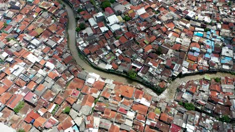 Pasupati-bridge-near-a-water-canal-in-Bandung,-West-Java-Indonesia,-Aerial-top-view-tilt-down-shot