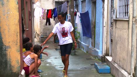 In-the-favela,-children-are-greeted-by-neighbors