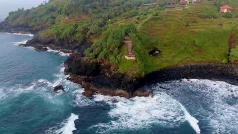 Aerial-view-on-viewpoint-platform-on-cliff-near-Menganti-beach-on-Java-Indonesia