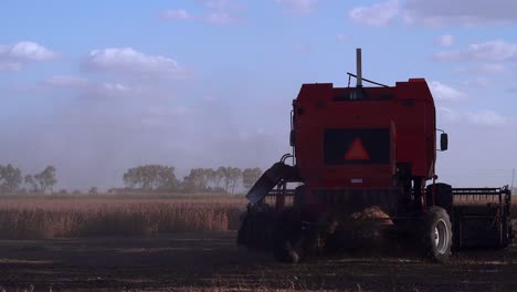 A-combine-harvesting-soybean-approaches-the-camera-and-turns-away-to-the-left