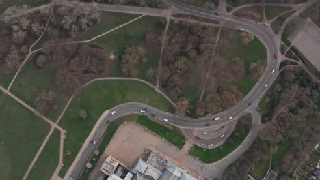 Over-head-drone-shot-of-busy-winding-road-Alexandra-palace-grounds