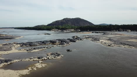 Beautiful-wide-aerial-shot-of-Orinoco-River-with-mountain-in-Vichada-Colombia