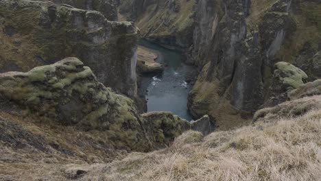 Fjadrargljufur-Canyon-and-surrounding-landscape,-Iceland.-Tilt-up-reveal