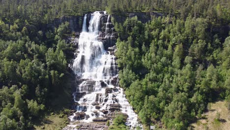 Upward-moving-aerial-of-Tvindefossen-waterfall---Famous-tourist-attraction-in-Voss-Norway