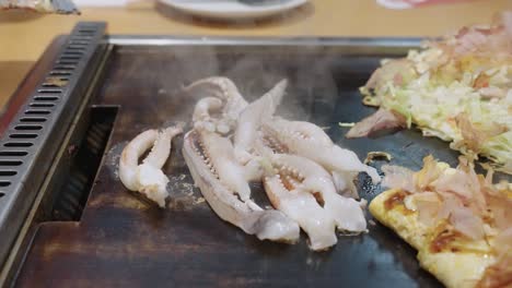 Grilled-Squid-Tentacles-cooking-in-slow-motion