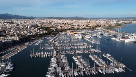 Boats-anchored-in-marina-of-Palma-de-Mallorca-in-sunny-day