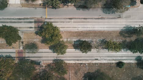 Drone-view-of-avenue-with-old-railroad-at-the-middle