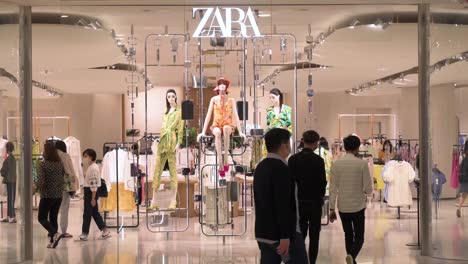 Shoppers-are-seen-at-the-Spanish-multinational-clothing-design-retail-company-by-Inditex,-Zara-store-in-Hong-Kong