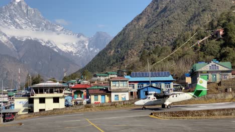 Lukla,-Nepal---March-9,-2021:-A-plane-coming-into-the-Lukla-Airport-in-the-Himalaya-Mountains-of-Nepal