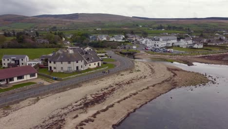 Aerial-view-of-the-Scottish-town-of-Blackwaterfoot-on-the-Isle-of-Arran-on-an-overcast-day,-Scotland