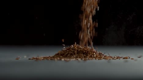 Cumin-falls-on-a-table-in-slow-motion