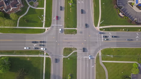 Aerial-drone-shot-of-a-busy-intersection---Fly-Down