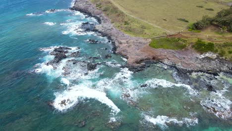 Rocks-on-Beautiful-Island-Coastline-of-Maui,-Hawaii---Aerial