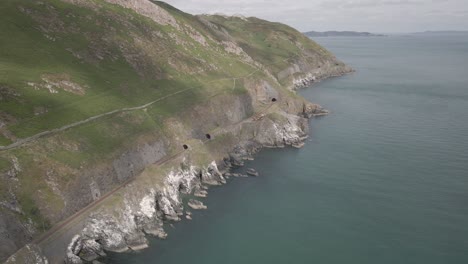 Railway-Tracks-On-The-Cliffs-Passing-Through-The-Tunnel-At-Bray-Head-Mountain-In-Wicklow,-Ireland