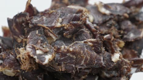 Plate-Of-South-African-Biltong-A-Dried-Out-Meat-Cut-Into-Small-Snack-Size-Pieces