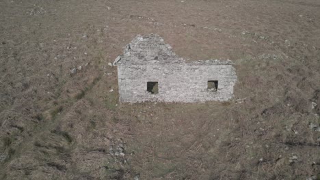 Neglected-stone-cottage-Wicklow-mountains-Ireland-aerial