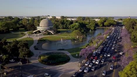 Aerial-pull-out-view-of-traffic-near-Galileo-Galilei-Planetarium-in-Buenos-Aires
