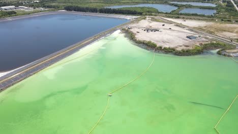 aerial-of-Piney-Point-phosphate-dam-break-danger-site,-phosphate-pool-cleanujp