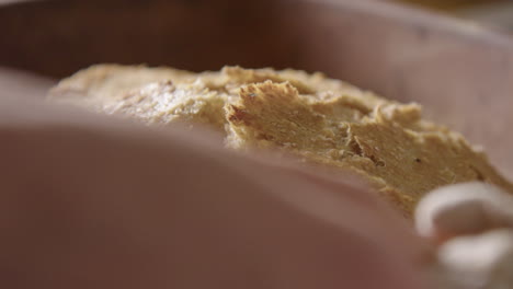 BAKING---Delicious,-freshly-baked-sourdough-bread,-slow-motion-close-up