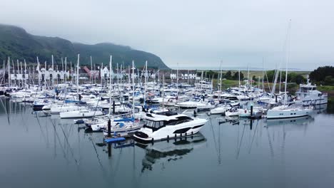 Luxury-yachts-and-sailboats-parked-on-misty-mountain-range-Conwy-retirement-village-marina