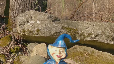 Colorful-miniature-of-elf-with-blue-hat-along-Invorio-trail-of-elves-in-Italy