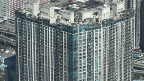 High-rise-building-apartment-exterior-during-the-day-High-angle
