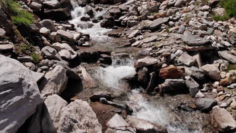 Rapids-Flowing-Over-Large-Rocks-Of-Valleys-Near-Stausee-Wasserfallboden-In-Kaprun,-Austria