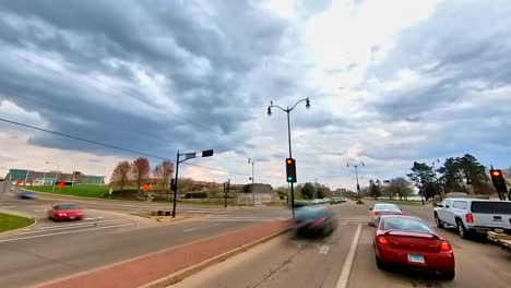 Commuters-Driving-on-City-Roads-in-Beloit,-Wisconsin