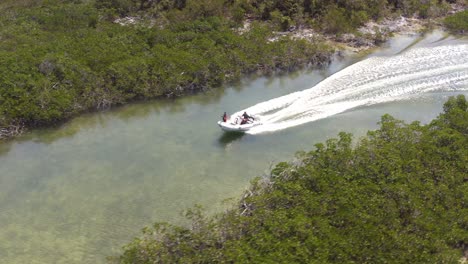 Motorboat-On-Speed-Running-Through-Waters-Passing-With-Lush-Mangroves-At-Bahama-Islands,-Florida