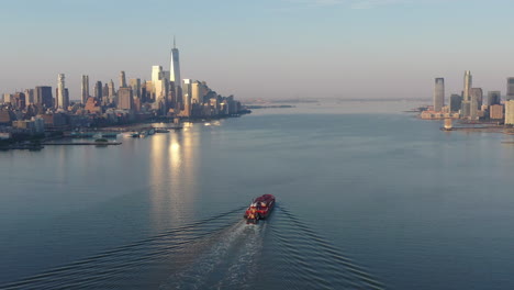 An-aerial-view-of-lower-Manhattan-and-New-Jersey-from-over-the-Hudson-River-at-sunrise