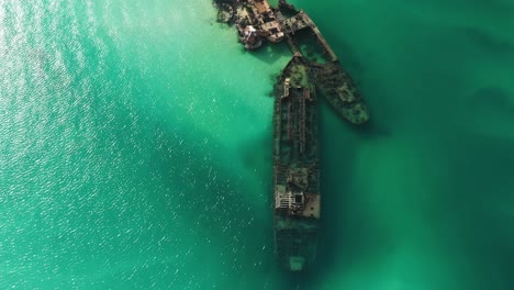 Fly-over-Moreton-Island-ship-wrecks,-beautiful-clear-water,-Queensland-Australia